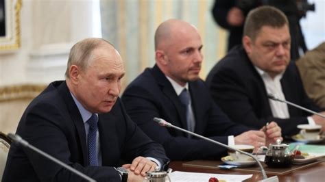 Putin says he might try to seize nearby territory in Ukraine to prevent cross-border strikes